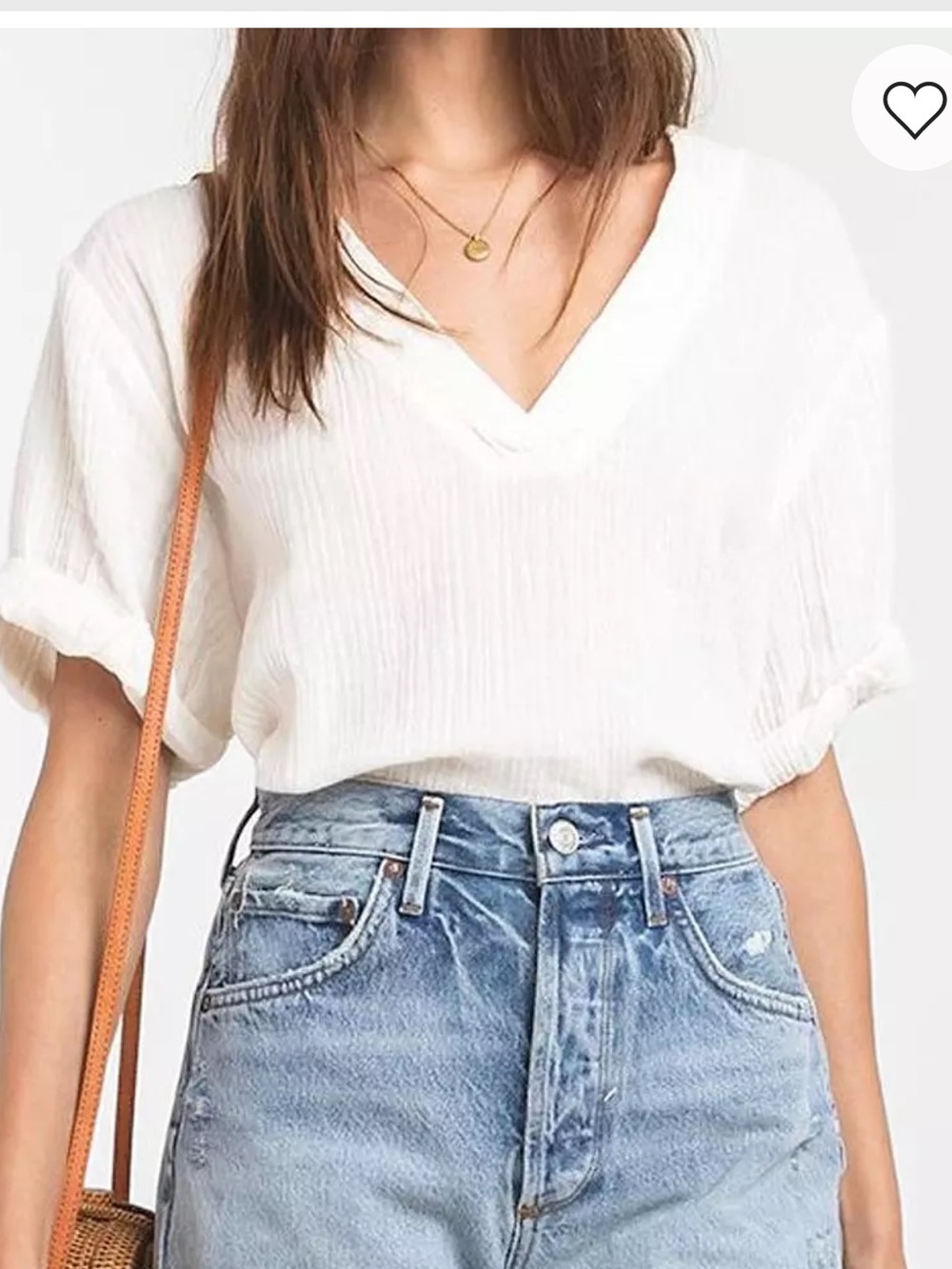 Rag Poets textured gauze top with a V-neckline and cuffed short sleeves.
